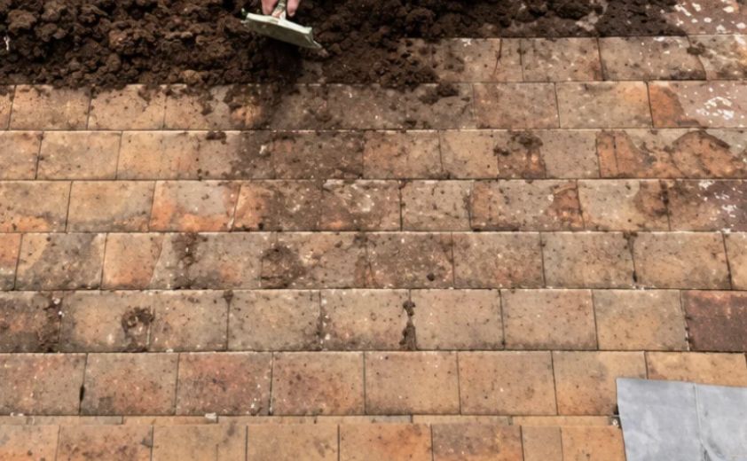Grimy brick wall before washing