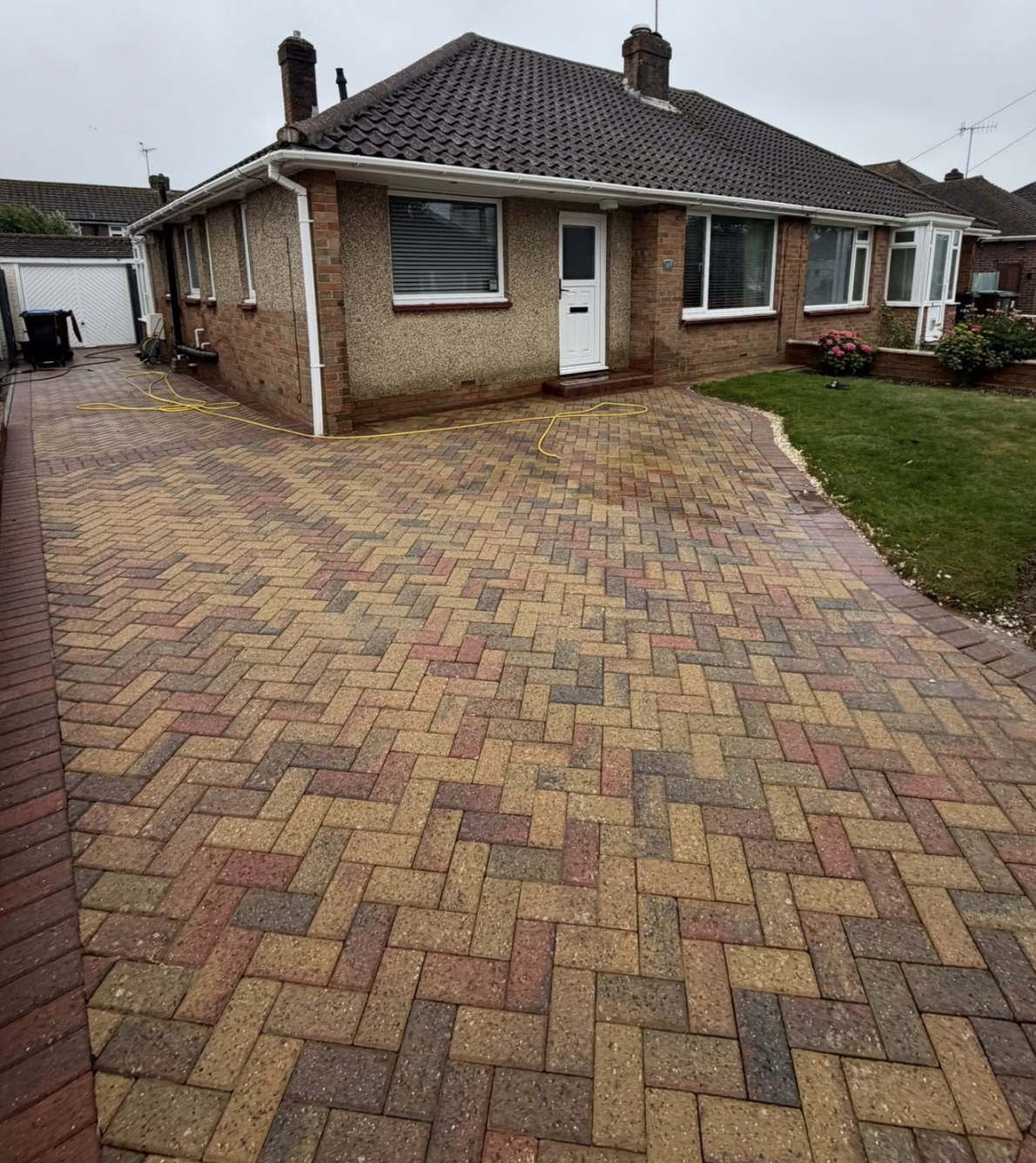 Restored block paving driveway after Arcline cleaning