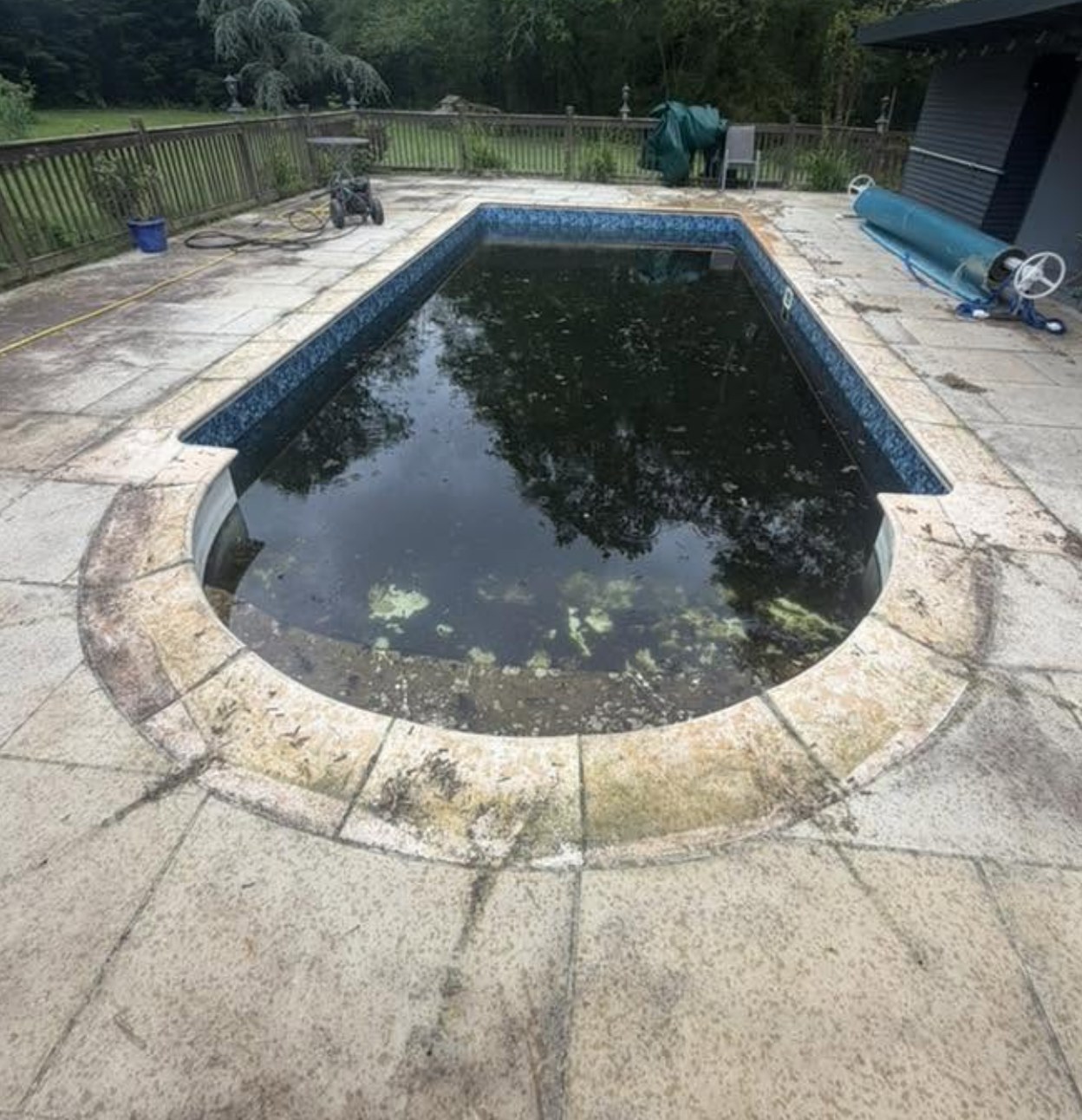 Pool surround patio stained and dirty before cleaning